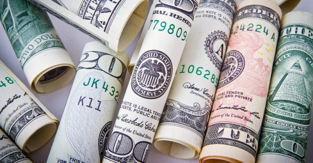 Close-up of rolled US dollar bills symbolizing wealth, financial success, and currency.